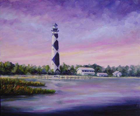 View of the Cape Lookout Lighthouse in a purple evening sky.